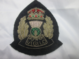 Scottish police officers cap badge. Schotse politie pet embleem officier.