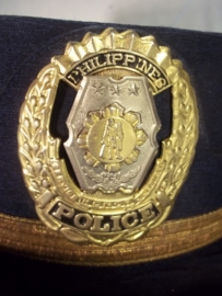 Female Policecap Philippines. Dameshoedje van de Filipijnse politie, mooi embleem