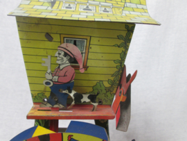 Tin play toy, mechanical, works with sand. Blikken speelgoed dat door zand de molen laat draaien en bewegen MERRY MILLER.