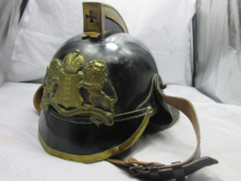 Leather fire department helmet of the City of Amsterdam. Leren Amsterdamse brandweerhelm. zeer nette staat, met brandweerstempel aan de binnenkant.