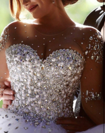 Prinsessen trouwjurk wit met glitter en steentjes | tule | maat 38-40-42