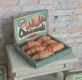 Vintage Winkeldisplay met Croissants