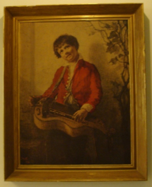 Jongen met muziek instrument in lijst 61 x 76