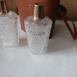 Parfum drank flessen in hoes verrekijker