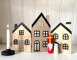 Rij houten huisjes zwart wit