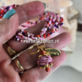 RZ 0006: Schattig Armbandje elastisch met lampwork kraal