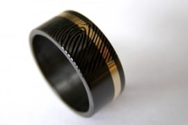 Zwarte zirkonium ringen met gouden band