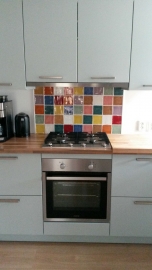 Kleurrijk mozaiek in de keuken