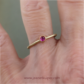 ring with a rose cut ruby