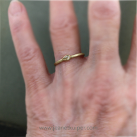 ring with a teardrop rose cut champagne diamond
