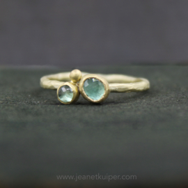 ring in organic gold with a sapphire and tourmaline