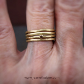 set van vier ringen met diamant