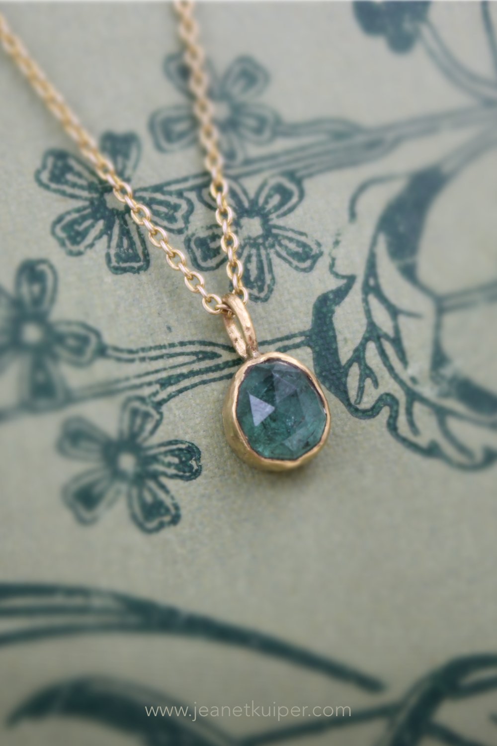 pendant with a rose-cut tourmaline