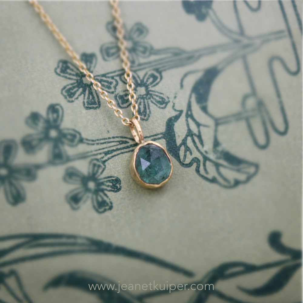 pendant with a rose-cut tourmaline