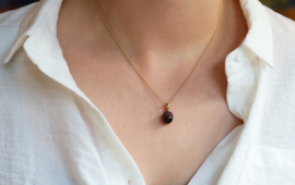 Eikel nootje van tijgeroog steen