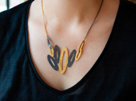  Deco Echo ketting met midden schakels ( goud zwart ) 