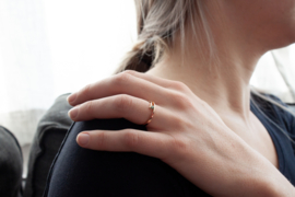 Rose golden ring with blue diamond