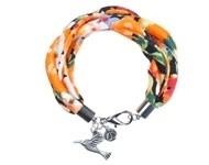 Stoffen armband oranje met vogel