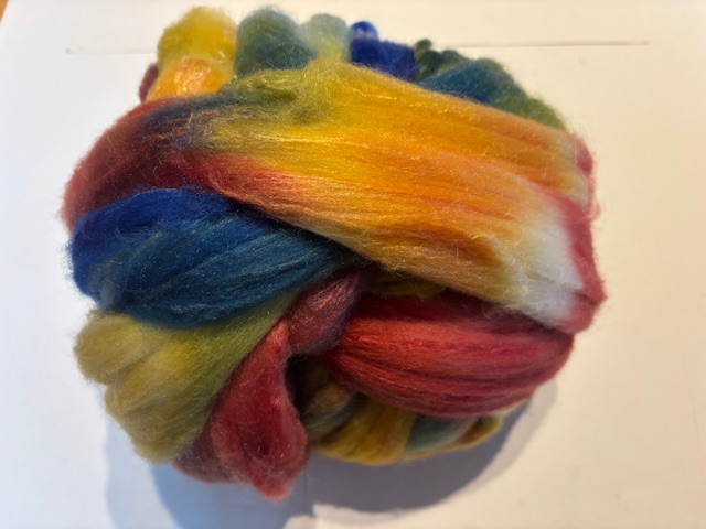 Zelf geverfde merinowol met zijde, nummer 12 regenboog tinten, per 50 gram
