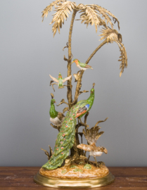 Porselein met bronzen vogel kunstwerk