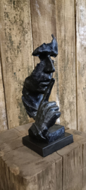 Fluisterende man bronzenbeeld