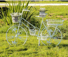 Fiets met vijf plantenmandjes metaal