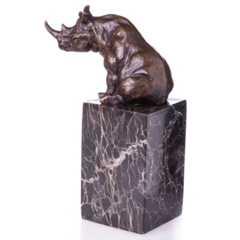 Zittende neushoorn brons beeld