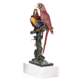 Papagaaien op stam brons beeld