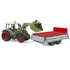 Fendt vario 211 met voorlader en aanhanger
