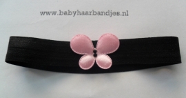 Voor de allerkleinste zwart haarbandje met roze vlindertje.