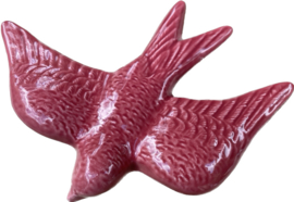 Keramische zwaluw donkerroze 16x12,5cm