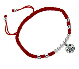 silver bracelet with coin charm