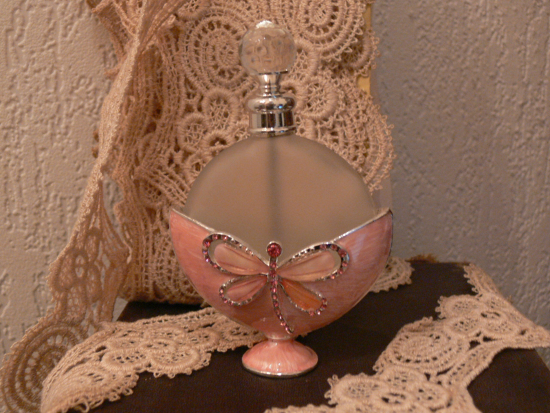 Parfumfles roze vlinder