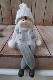 Winterkindje met bungelbeentjes