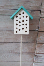 Insectenhuis op steker groen
