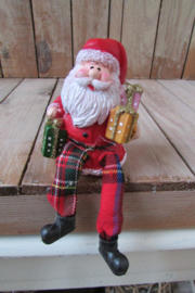 Kerstman met bungelbeentjes