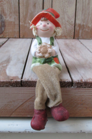 Herfstkindje met bungelbeentjes