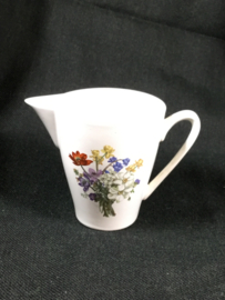 Bloemen melkkan. Nr 7