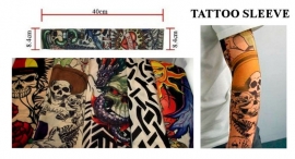 Tattoo sleeve zon, maan en doodskop