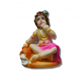 Krishna als kind resin beeld