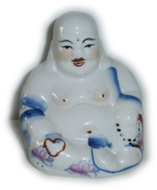 Witte porseleinen boeddha