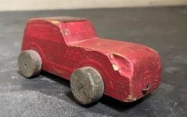 Oude houten speelgoed auto