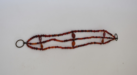 Oriental beads tie - back