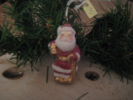 Kerstman met lantaarn en wandelstok