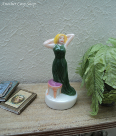 Statue pin-up girl in green dress