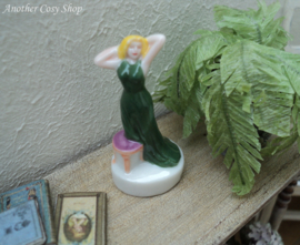 Statue pin-up girl in green dress