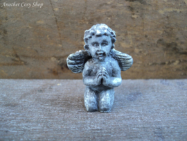 Angel with folded hands