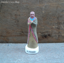 African statue man in festive clothing