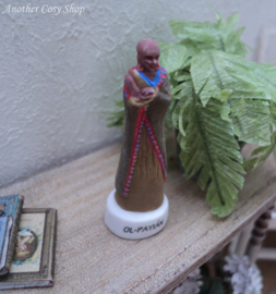 African statue man in festive clothing