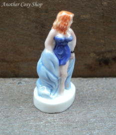 Statue pin up girl in short blue dress